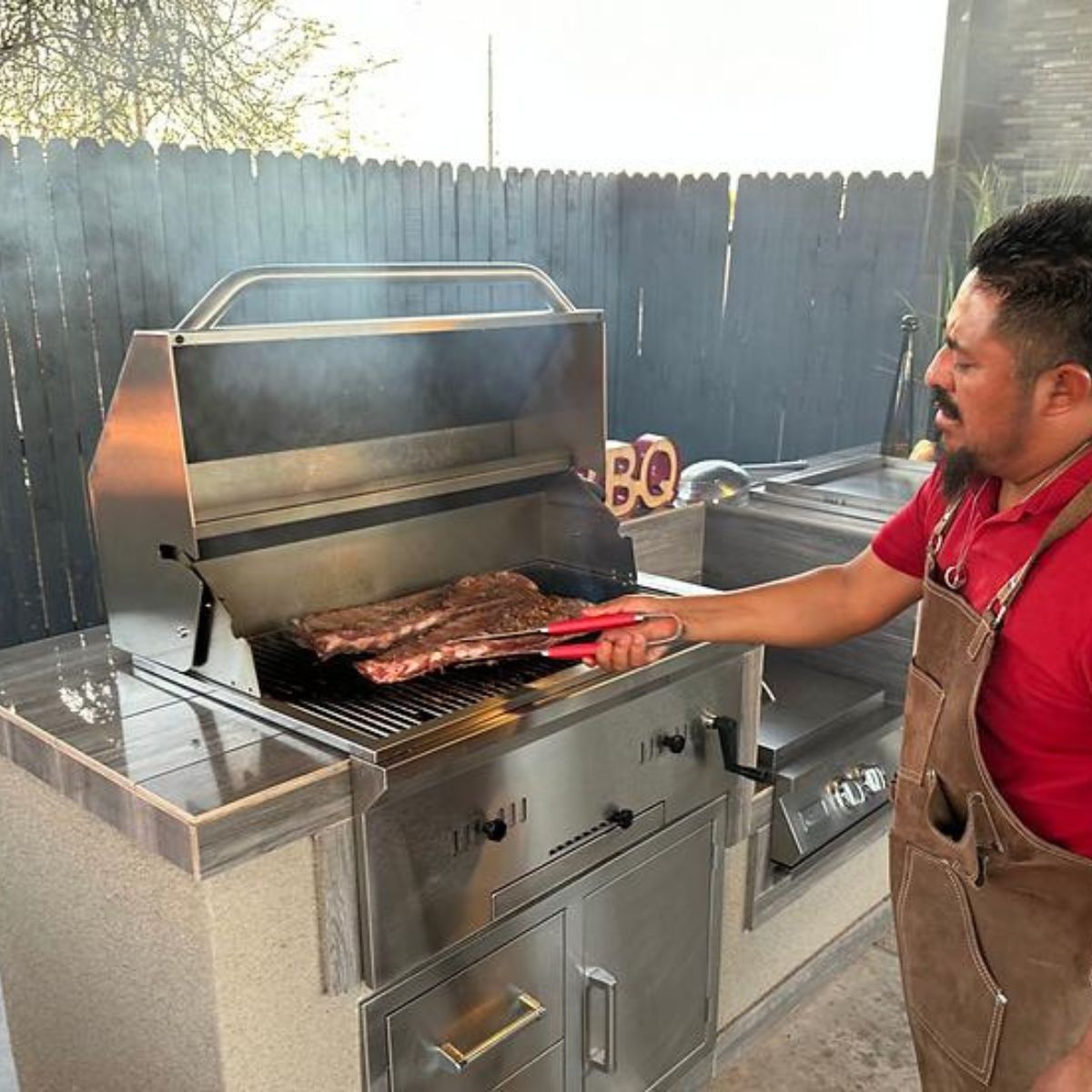 The Kokomo 32” Built-in Charcoal Grill when used fort grilling and smoking.